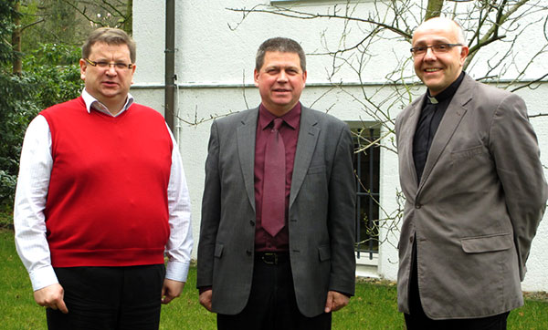 Dean Andris Krauliņš, Romāns Ganiņš, and Bishop Hans-Jörg Voigt.